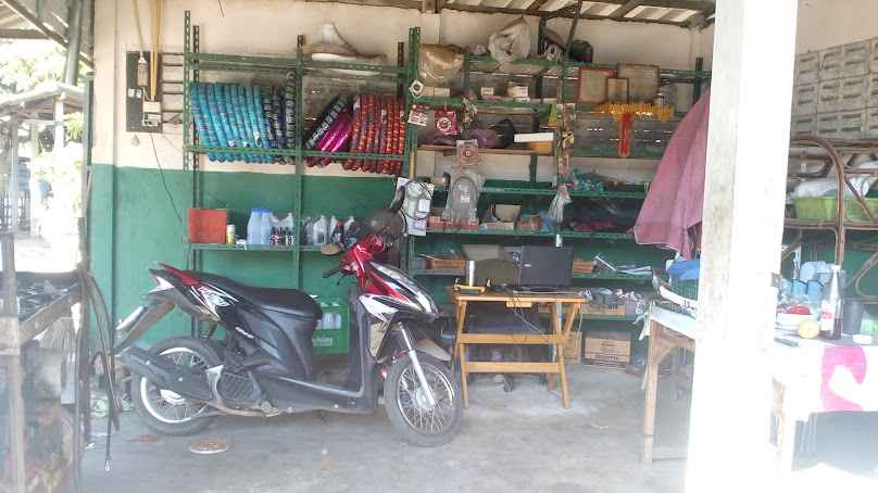 นนท์ ซ่อมรถจักรยานต์