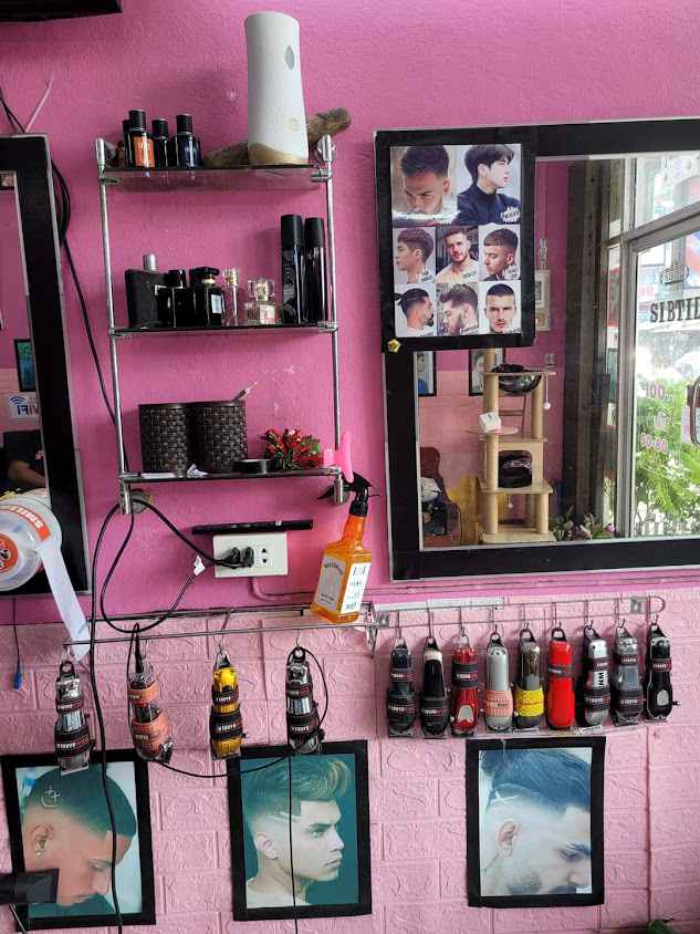 ร้านตัดผมชาย สิบทิศ